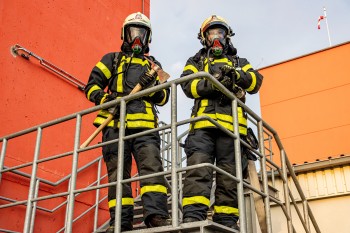 two-firemen-standing-on-stairs-3788978_(1).jpg